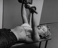 Philippe Halsman (1906-1979) Marilyn Monroe Lifting Weights, 1952