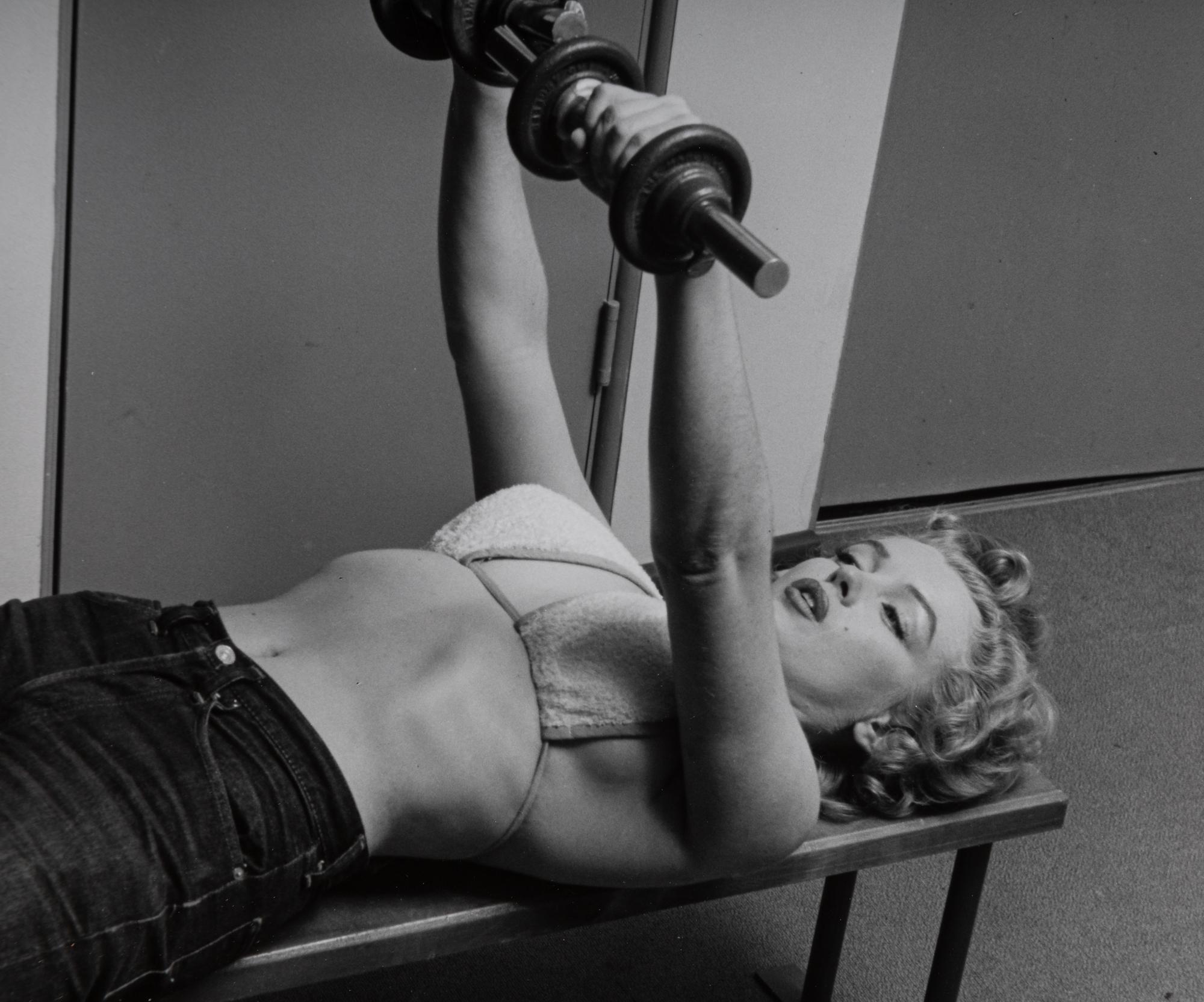 Philippe Halsman (1906-1979) Marilyn Monroe Lifting Weights, 1952
