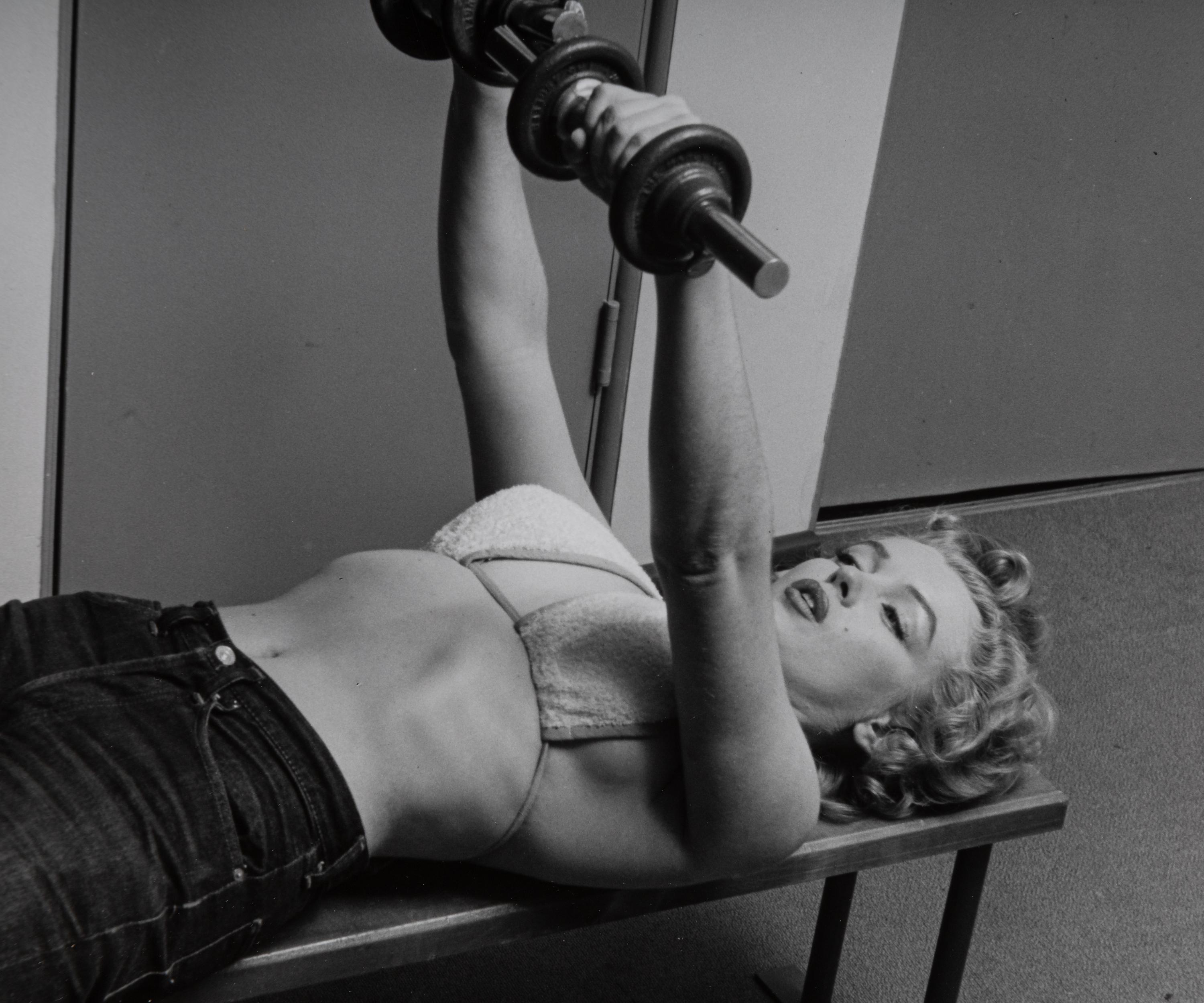 Philippe Halsman (1906-1979) Marilyn Monroe Lifting Weights, 1952