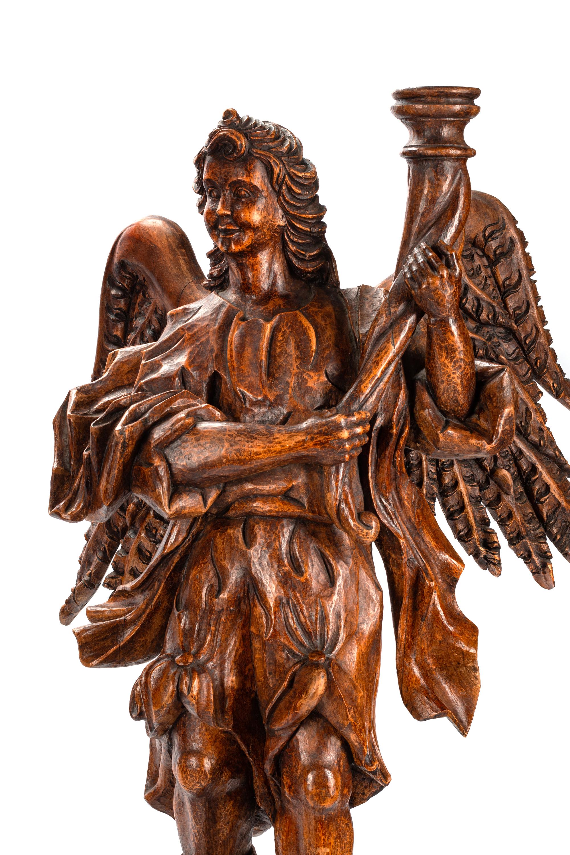 A Pair of Italian Carved Wood Figural Torchères