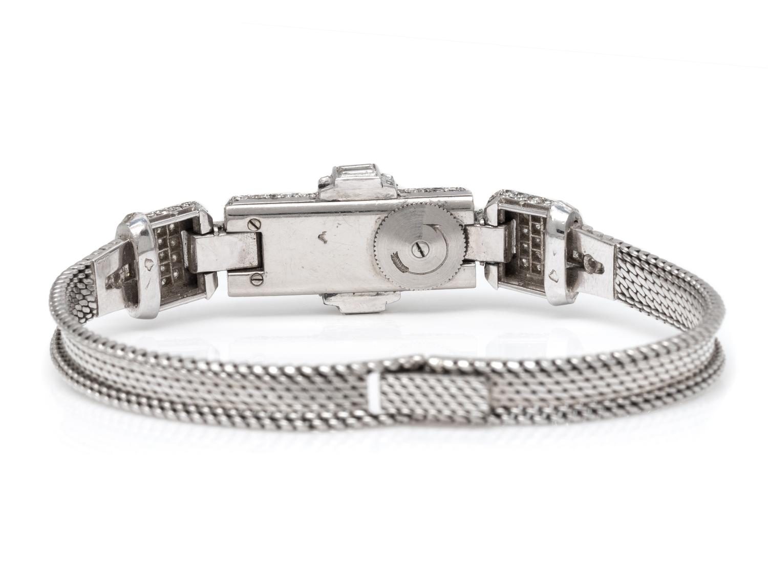 JAEGER-LeCOULTRE, PLATINUM AND DIAMOND SURPRISE WRISTWATCH