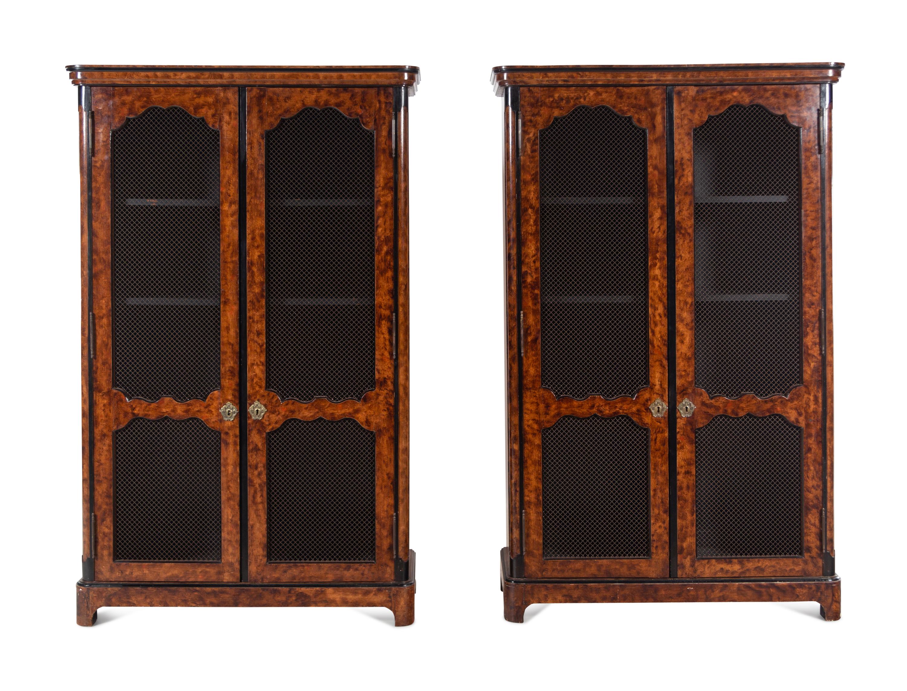 A Pair of Régence Style Faux Bois Painted Bookcases