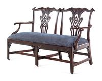 A George III Style Carved Mahogany Double Chair-Back Settee after a Design by Thomas Chippendale