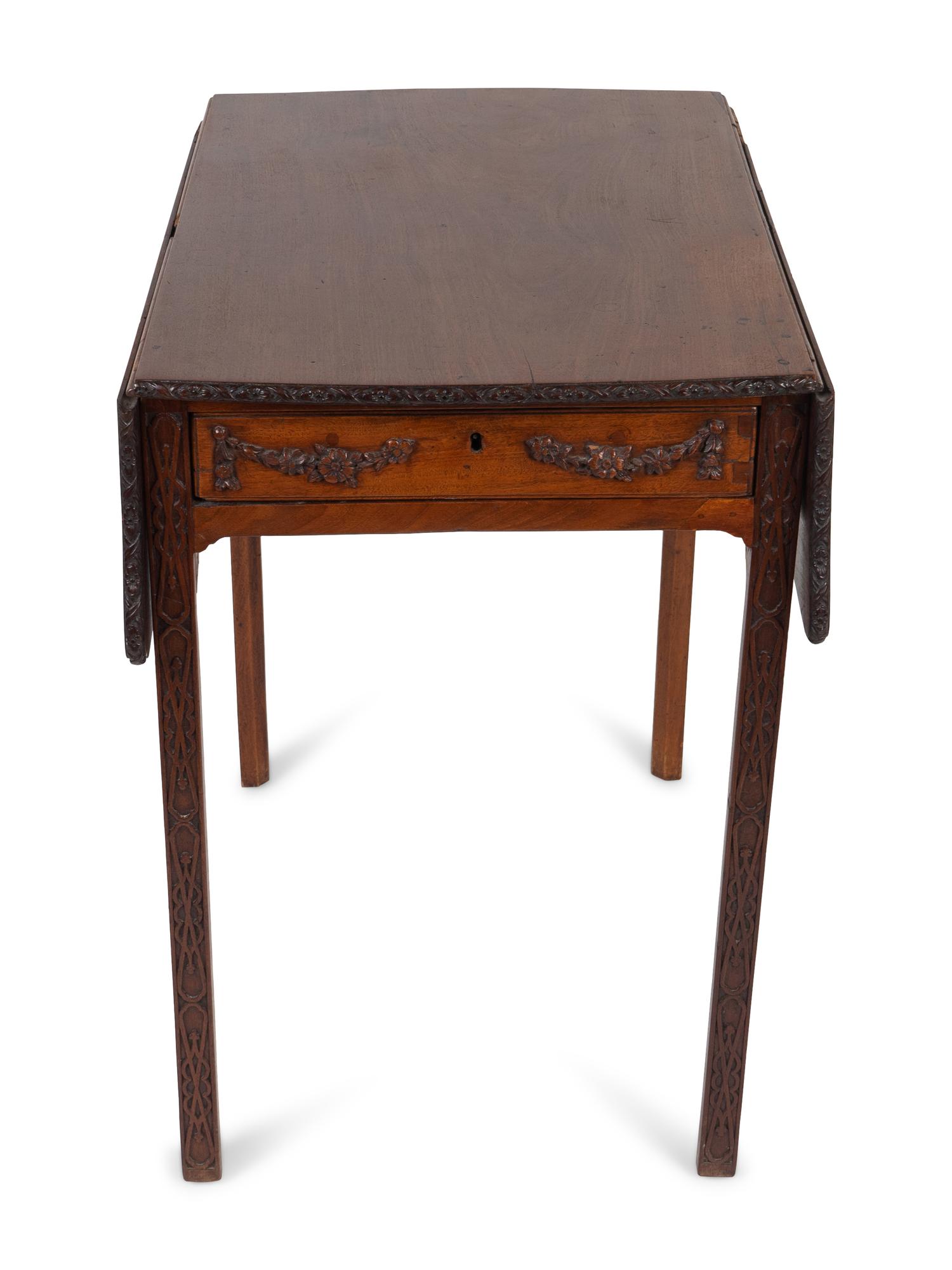 A Regency Style Mahogany Wall Shelf and a Fret Carved Pembroke Table