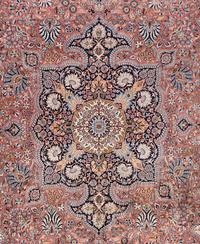 A Qom Wool and Silk Rug