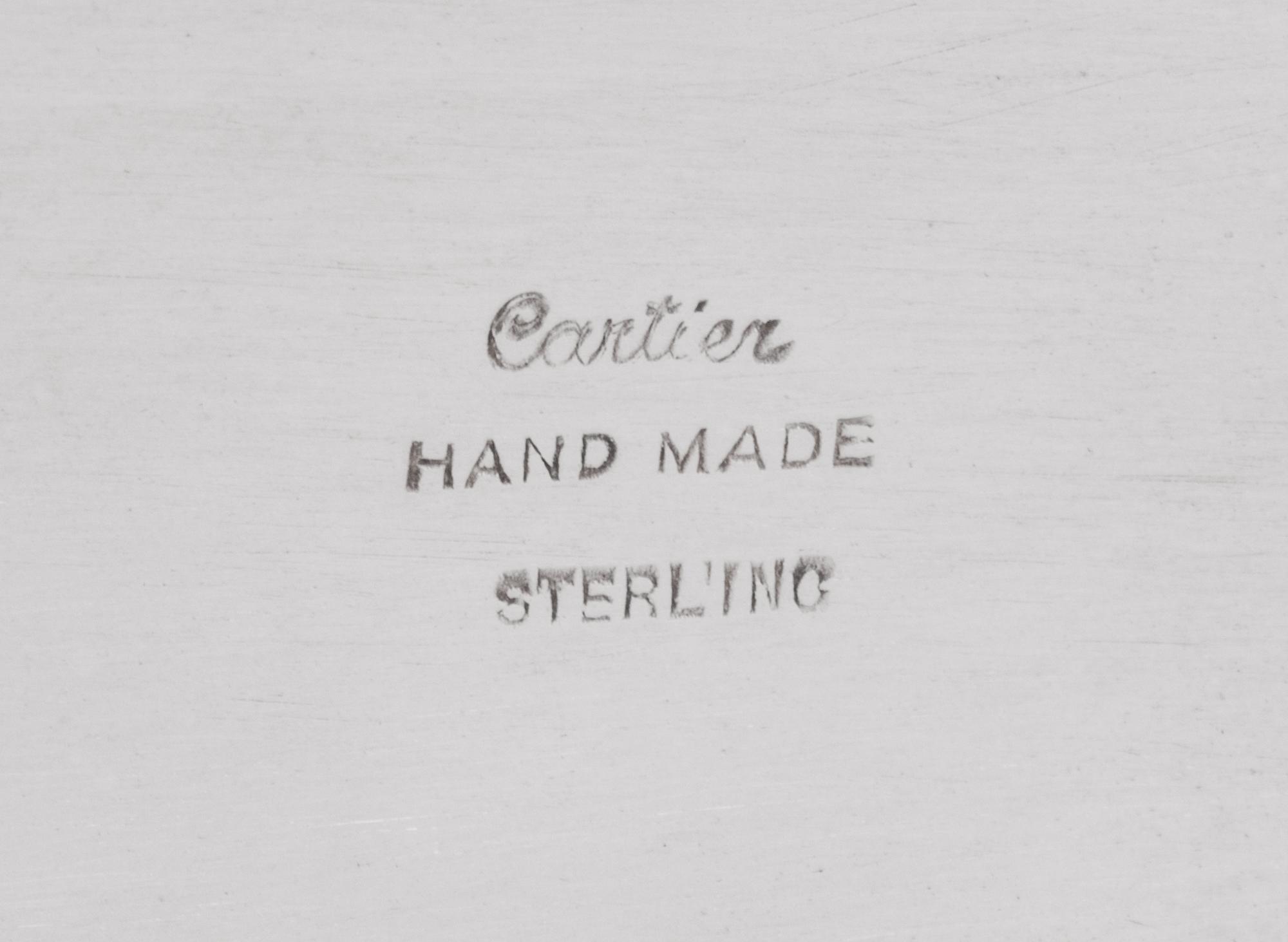 A Cartier Silver Table Article