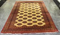 A Bokhara Wool Rug 8 feet 6 inches x 5 feet 11 inches.