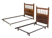 A Pair of Italian Walnut Twin Headboards Height 42 1/2 x width 38 1/4 inches.