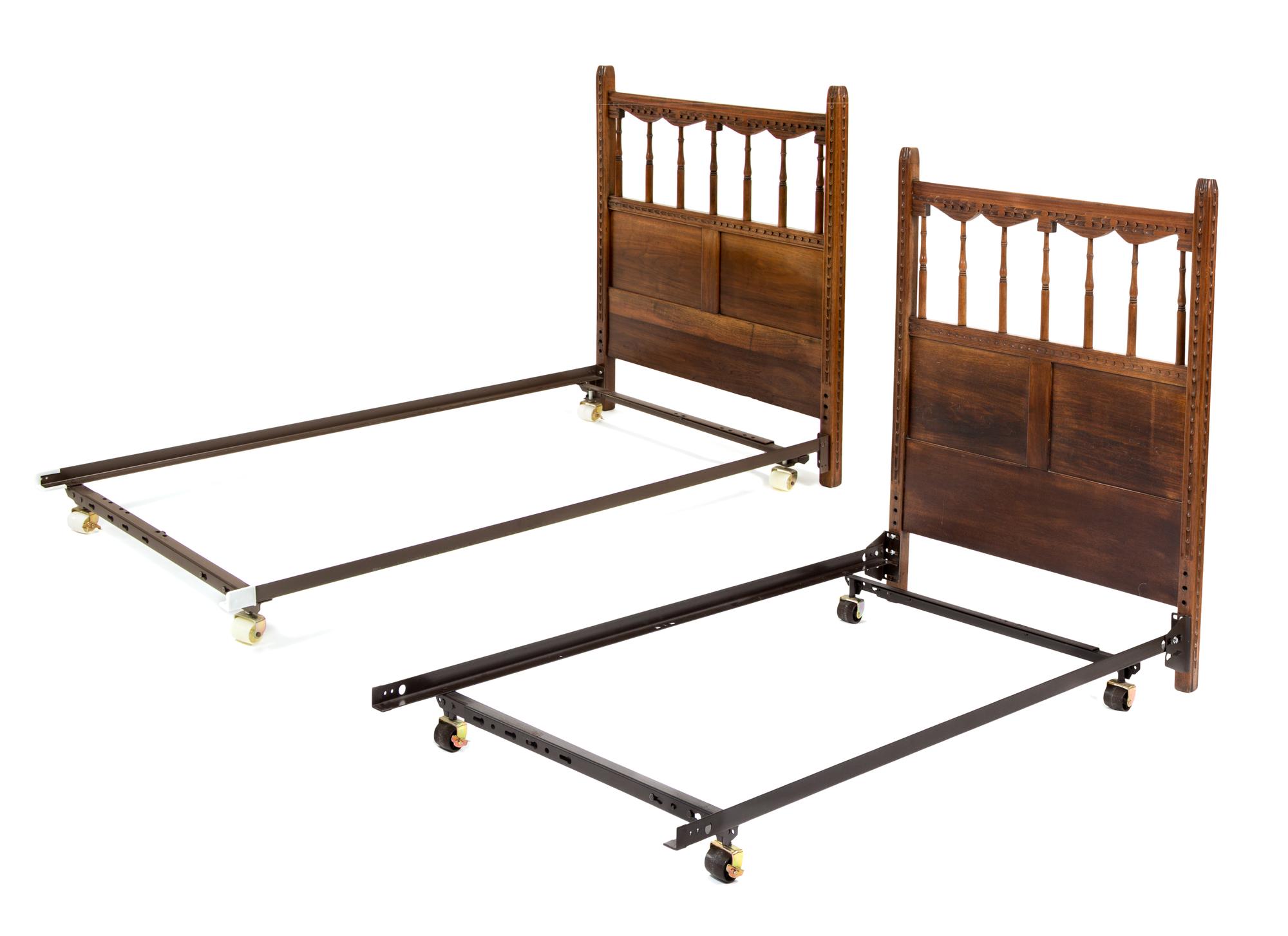 A Pair of Italian Walnut Twin Headboards Height 42 1/2 x width 38 1/4 inches.