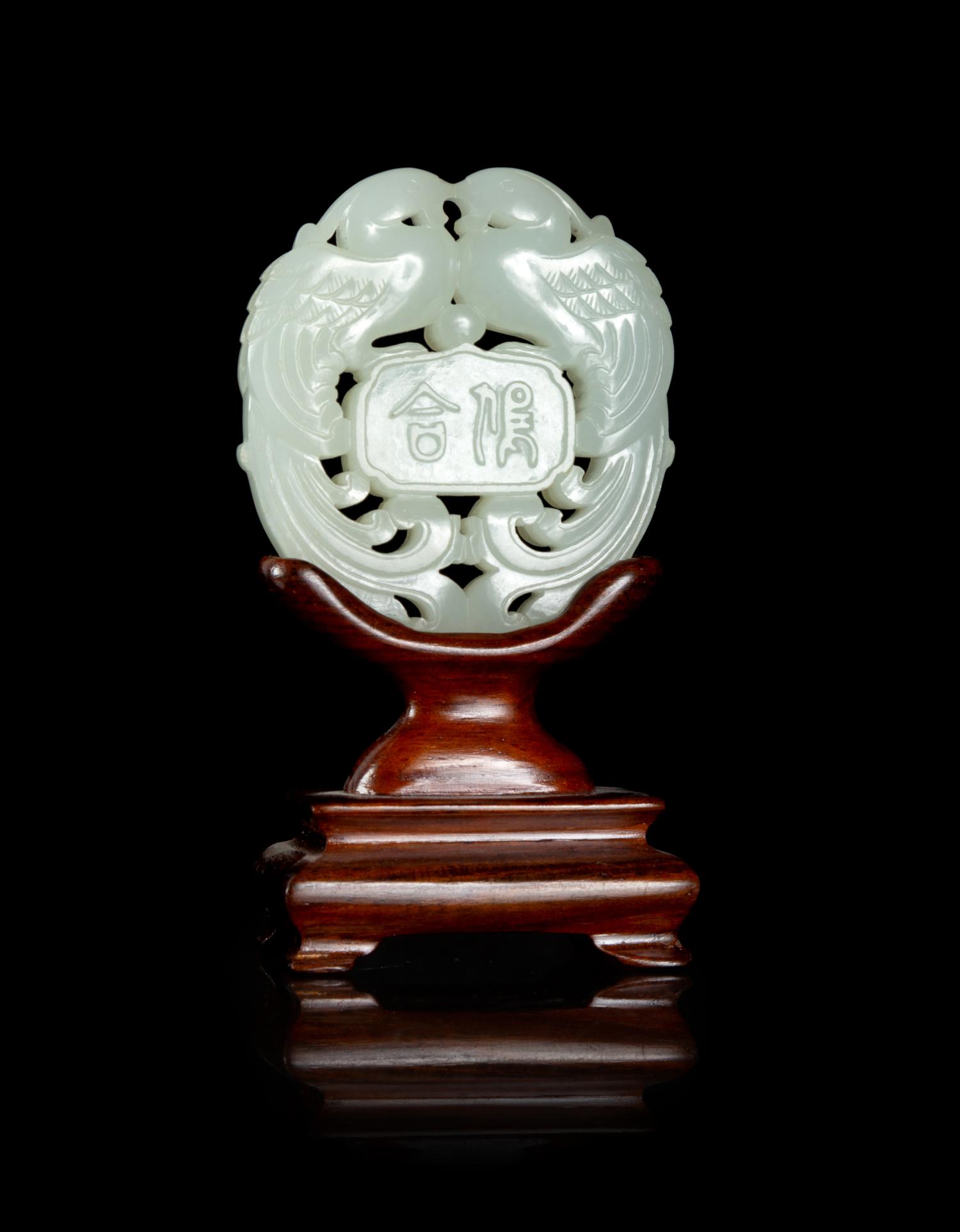 A Pale Celadon Jade 'Phoenix Bird' Pendant