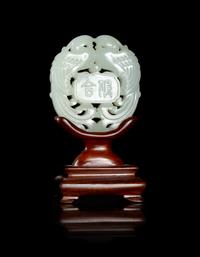 A Pale Celadon Jade 'Phoenix Bird' Pendant