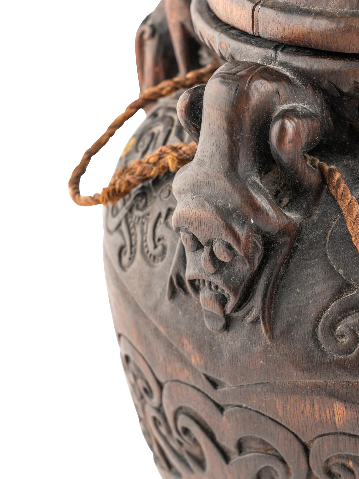 An Oceanic Carved Wood Lidded Vessel