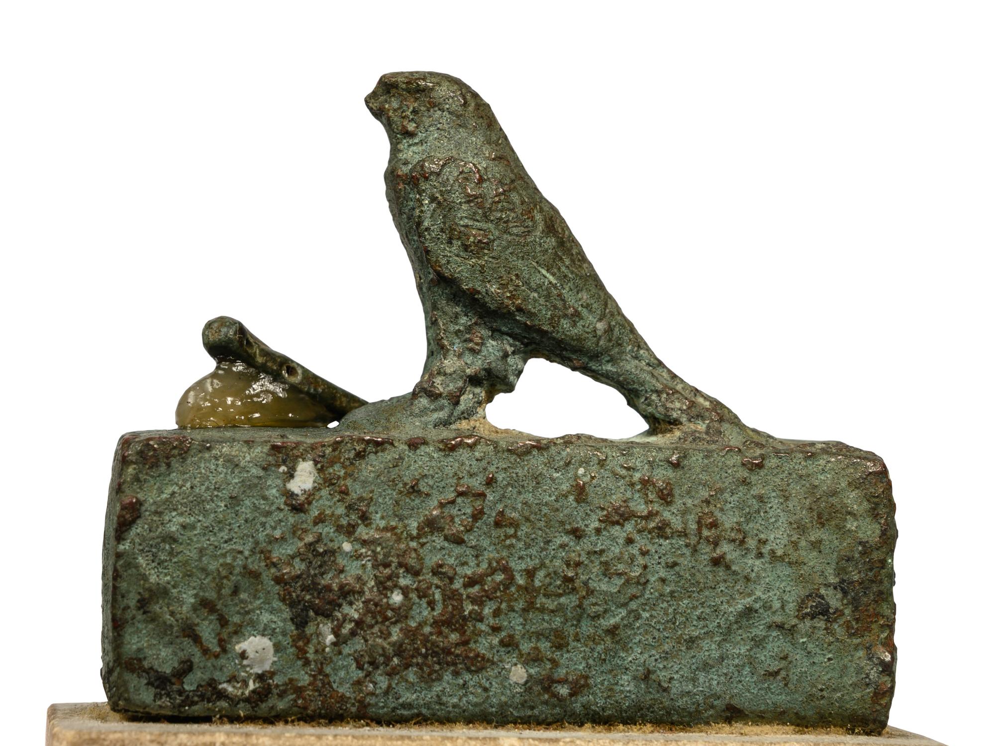 An Egyptian Bronze Falcon Coffin