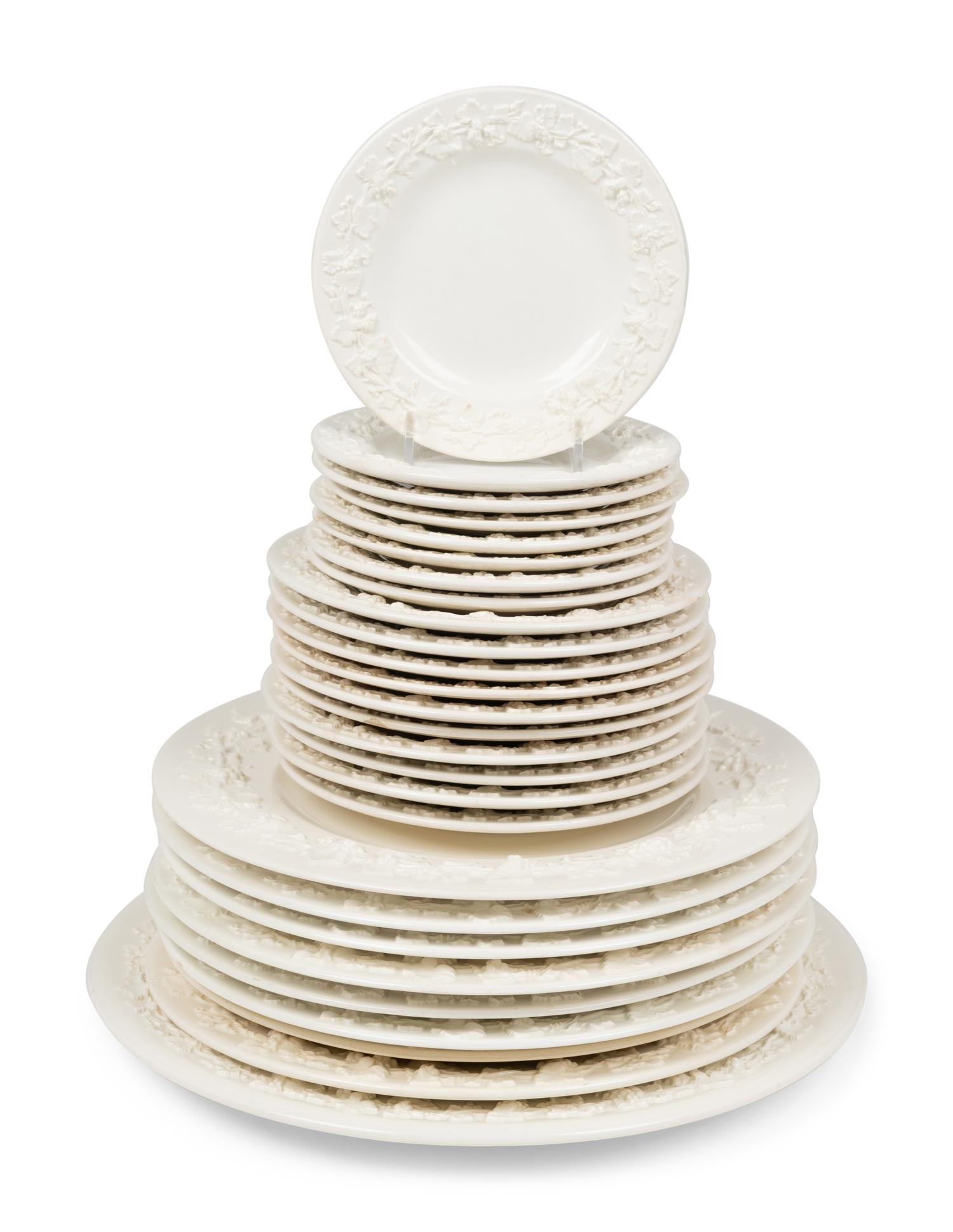 A Wedgwood Embossed Queensware Ceramic Dinner Service