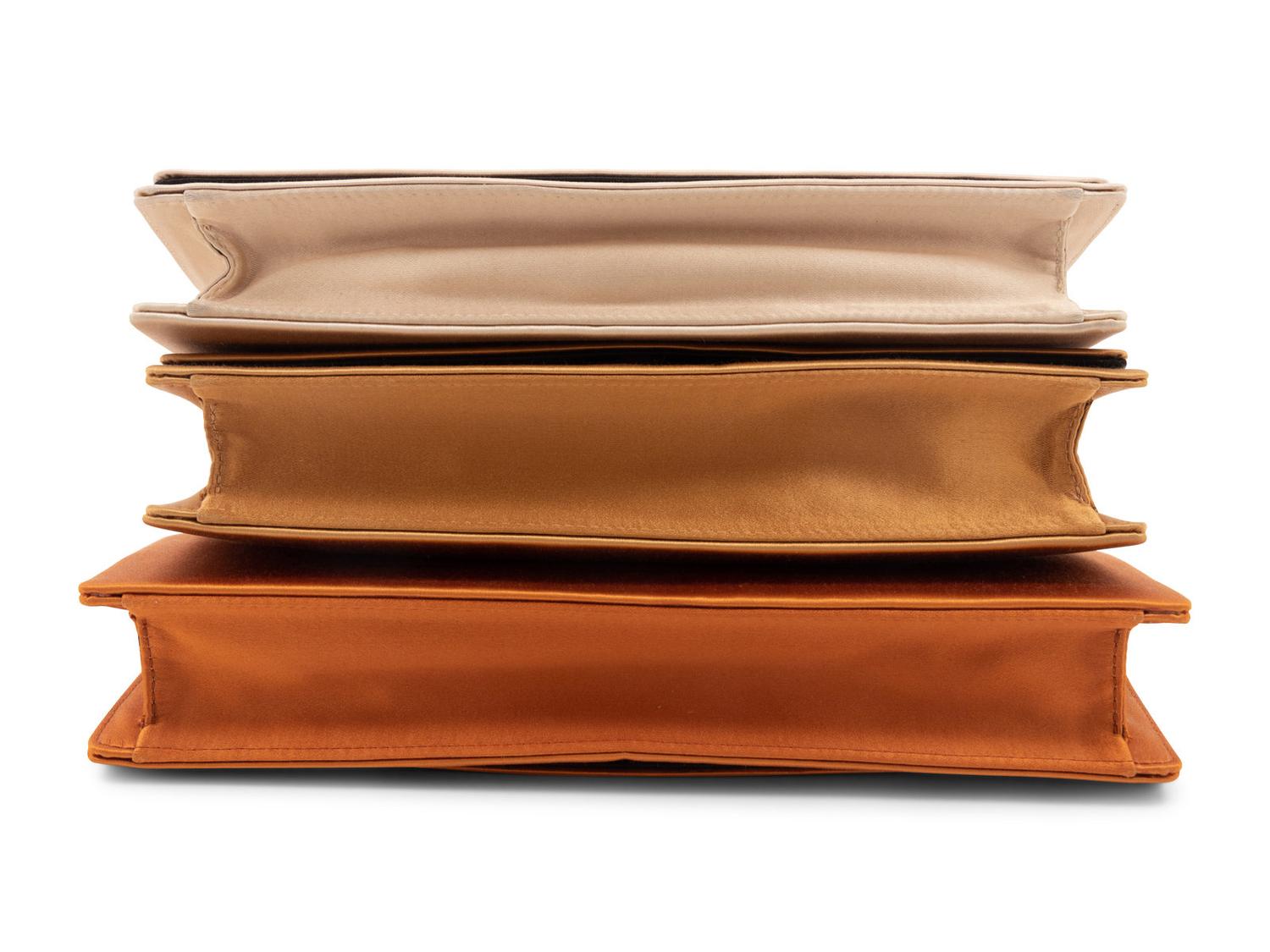 Five Designer Bags: Two Judith Leiber Bags, Three Prada Bags