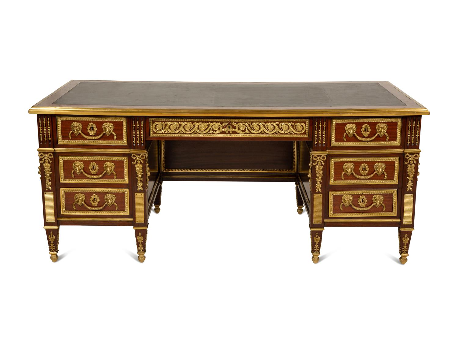 A Louis XVI Style Gilt Bronze Mounted Mahogany Bureau Plat