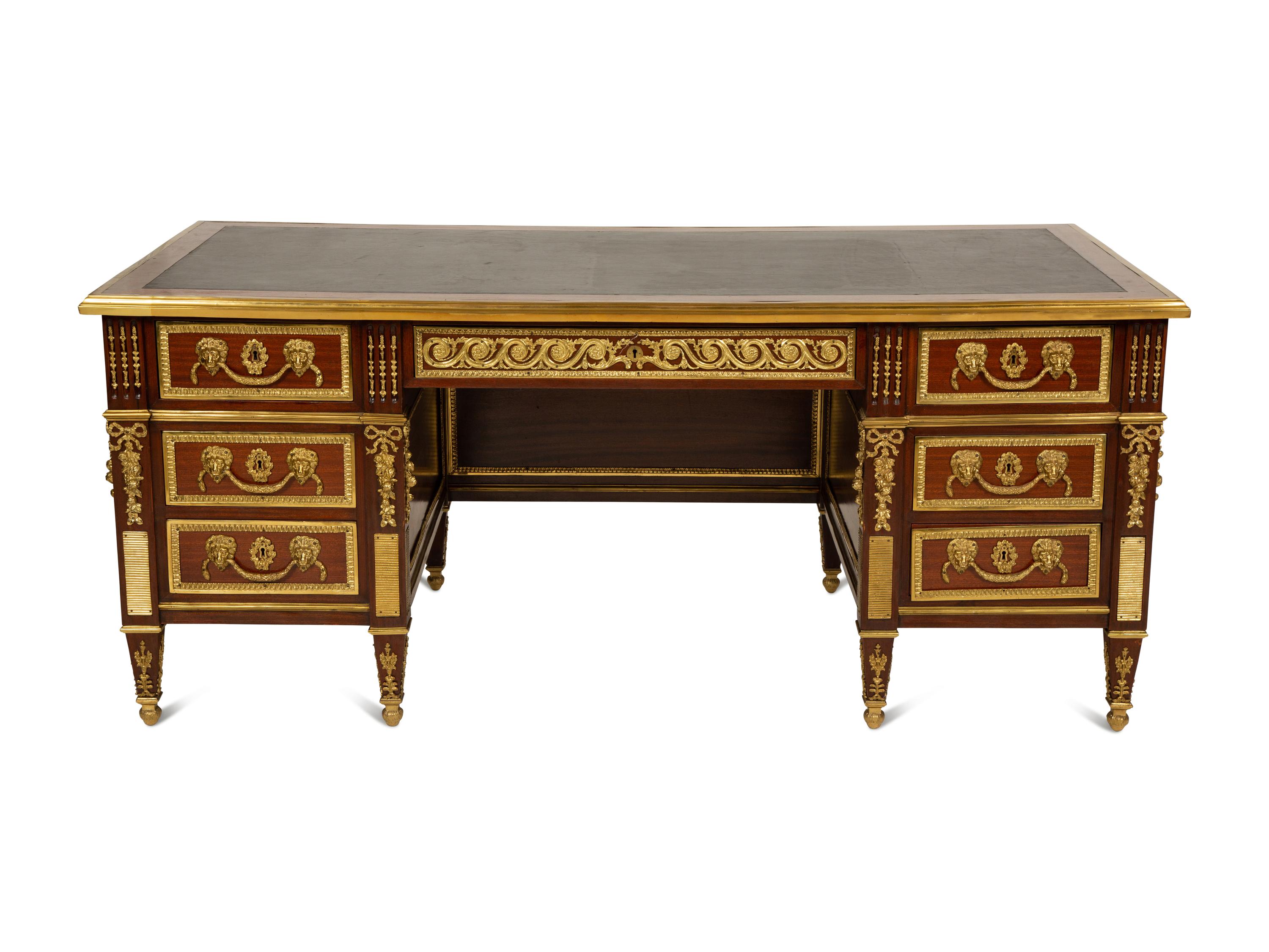 A Louis XVI Style Gilt Bronze Mounted Mahogany Bureau Plat
