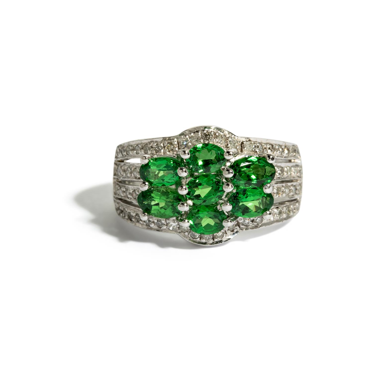 COLLECTION OF WHITE GOLD AND MULTIGEM JEWELRY