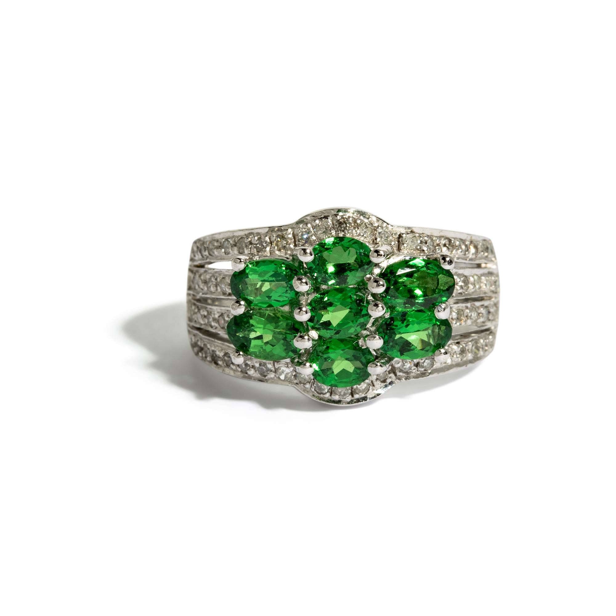 COLLECTION OF WHITE GOLD AND MULTIGEM JEWELRY