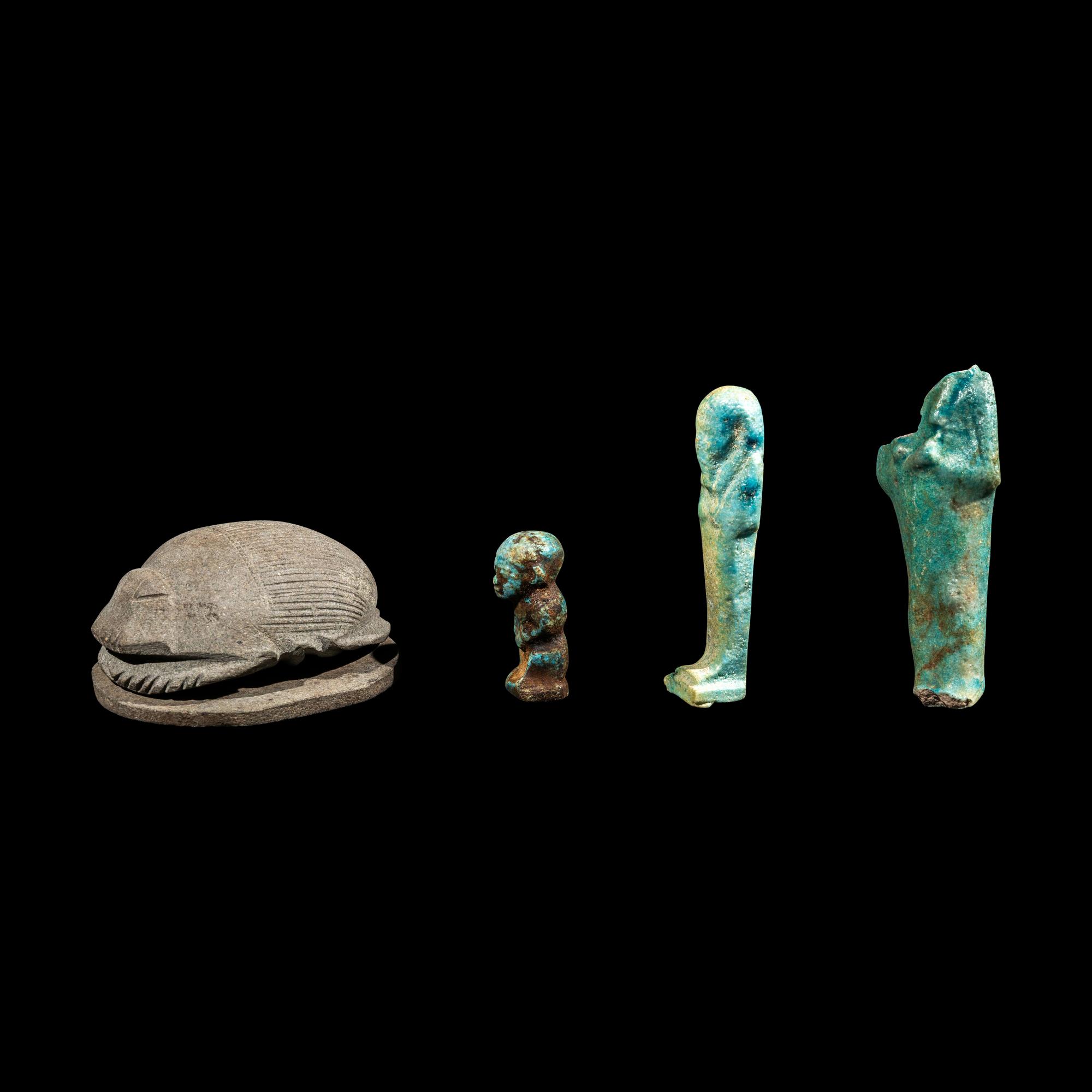 A Group of 5 Egyptian Stone and Faience Amulets