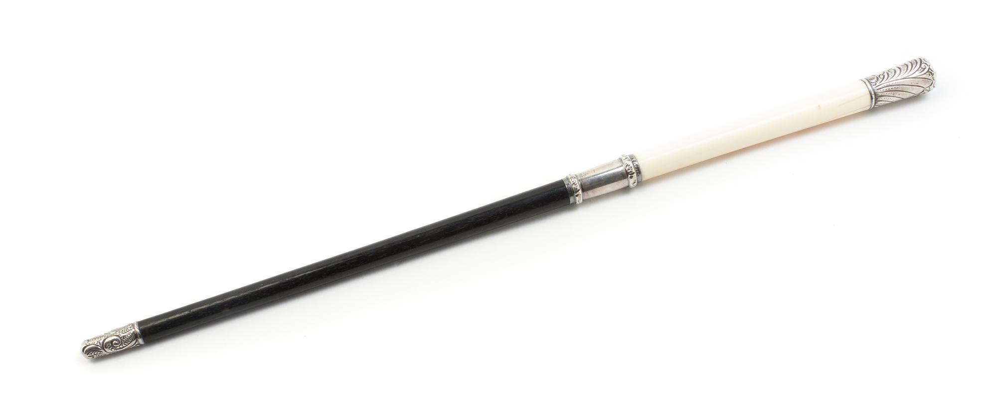 An Ebony, Ivory and American Sterling Silver Mounted Conductor's Baton, Length 16 inches.
