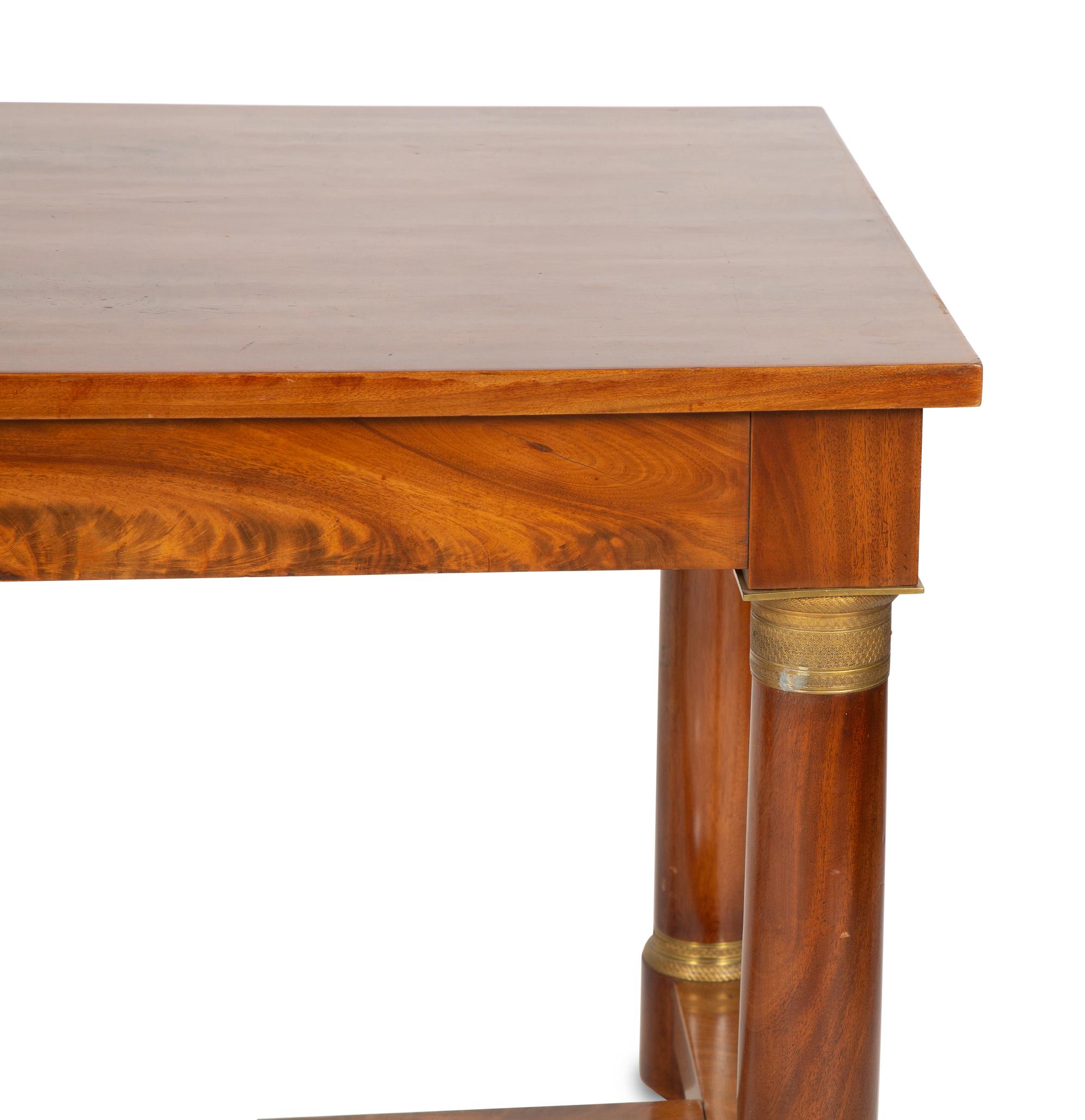 A French Empire Gilt Bronze Mounted Mahogany Table
