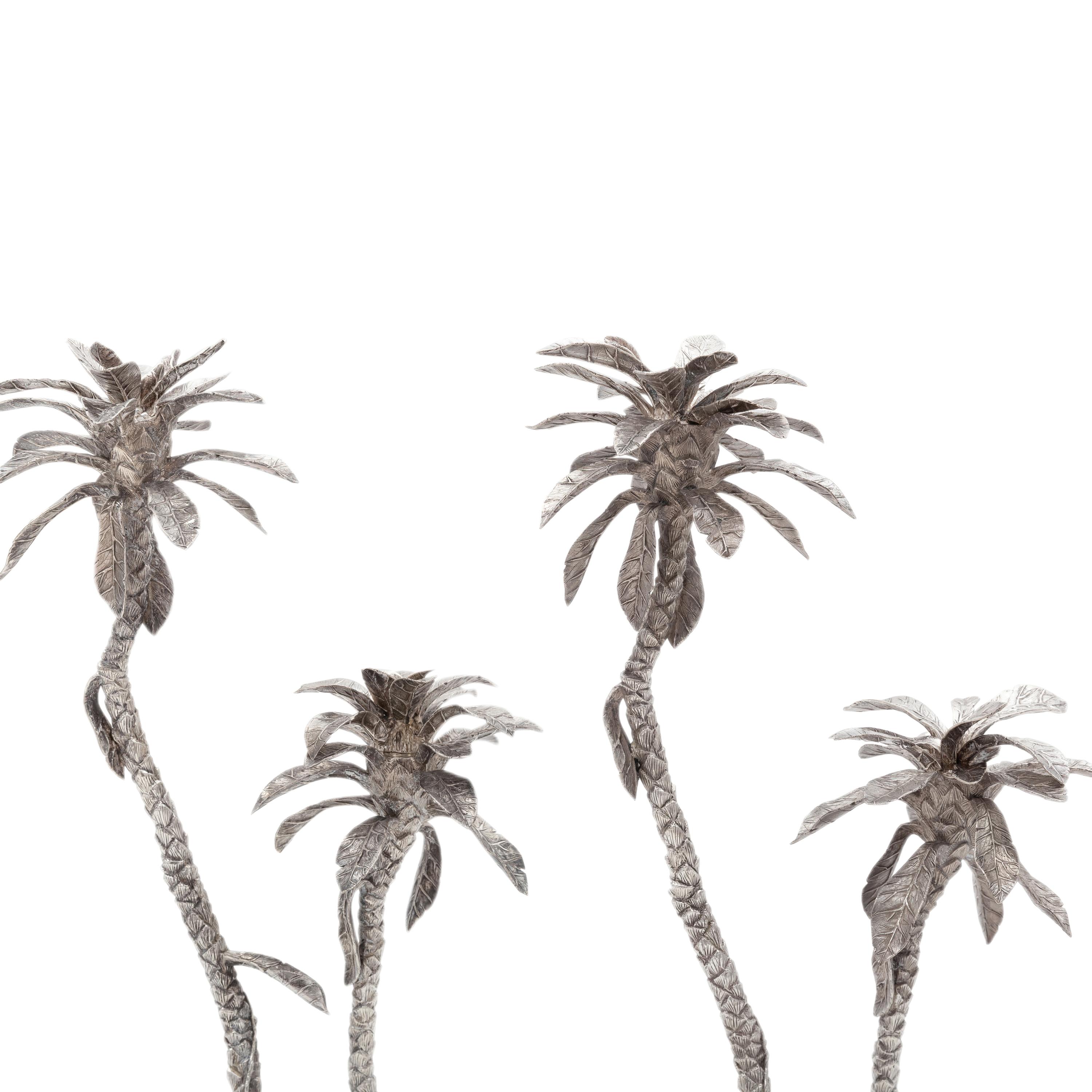 Patrick Mavros (London and Harare, Zimbabwe, Est. 1978) — A Near Pair of Equatorial Palm Tree Two-Light Candelabra, 1996 and ca. 2002
