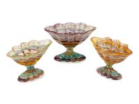 A Carved Agate Three-Piece Garniture