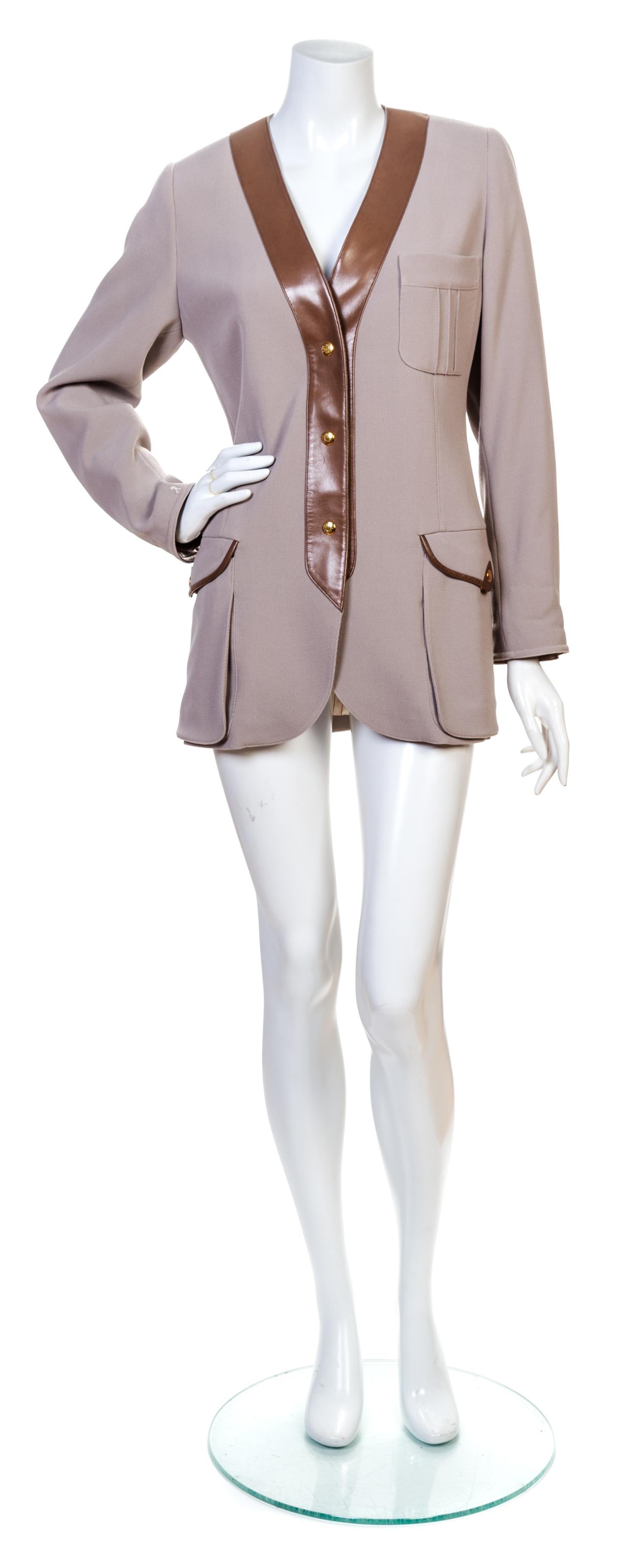 An Hermes Tan Wool Riding Jacket, Size 38.