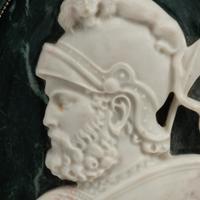 A Set of Four Italian Marble Oval Plaques