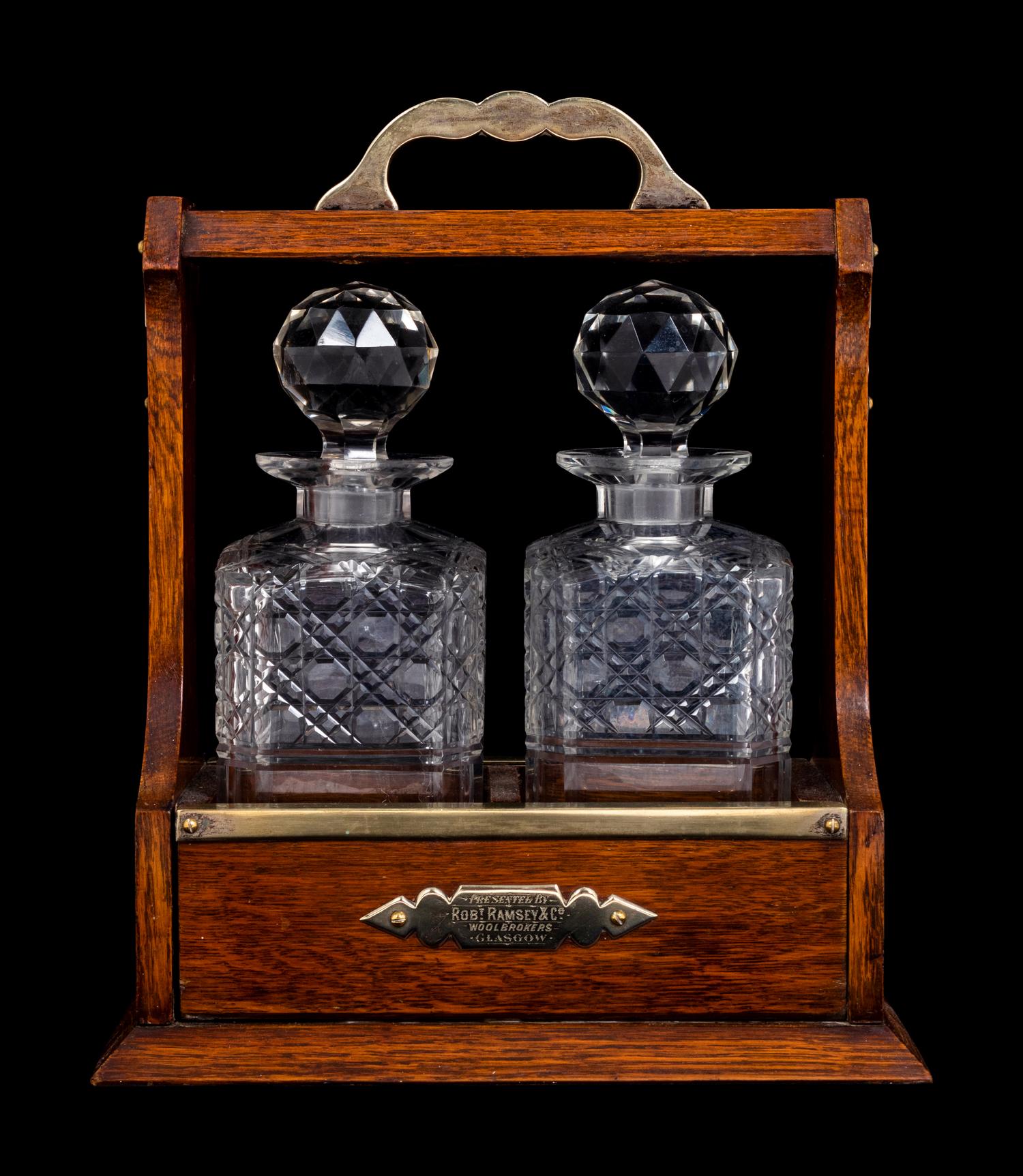 A Scottish Silver-Plate, Oak and Cut Glass Tantalus