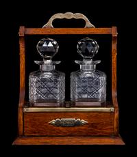 A Scottish Silver-Plate, Oak and Cut Glass Tantalus