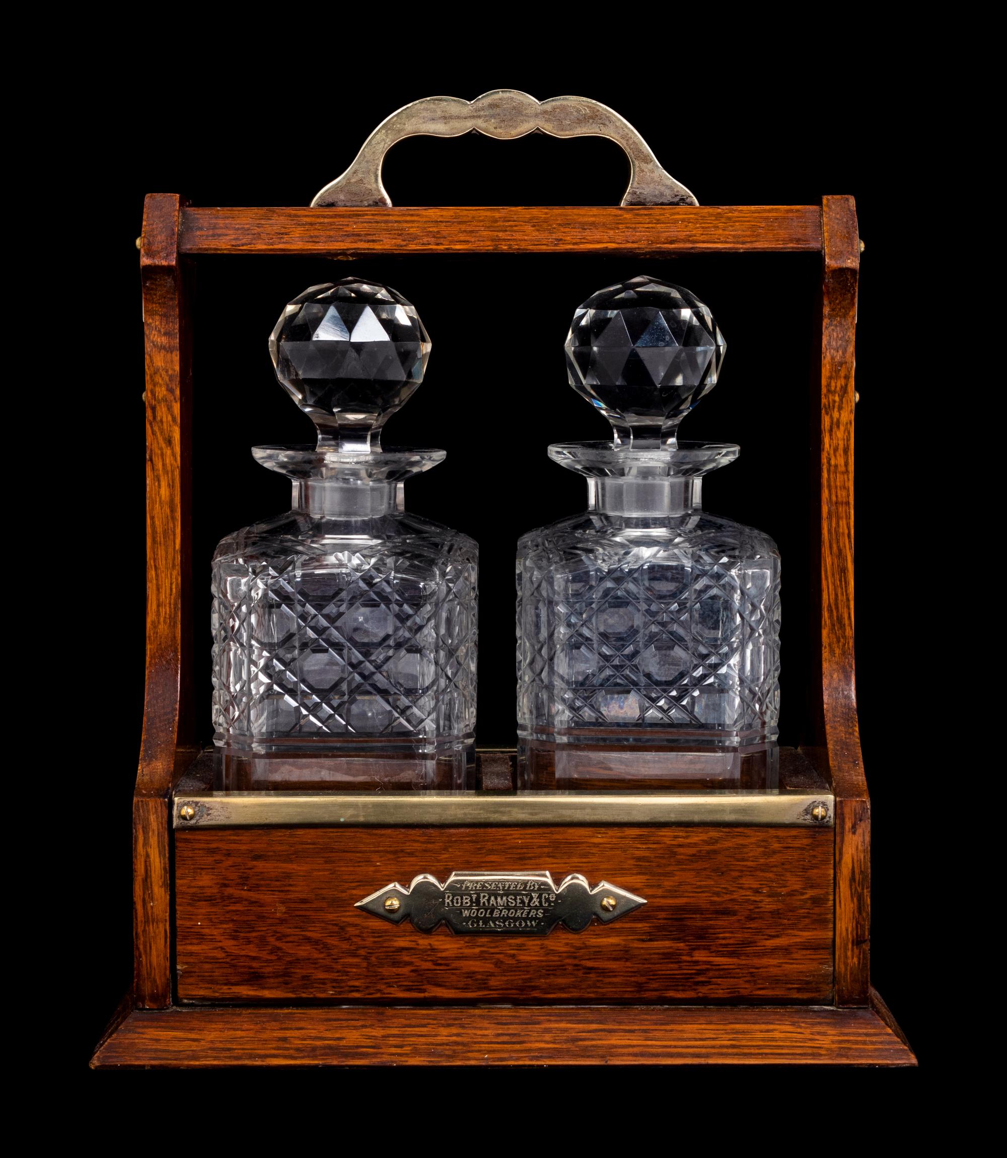 A Scottish Silver-Plate, Oak and Cut Glass Tantalus