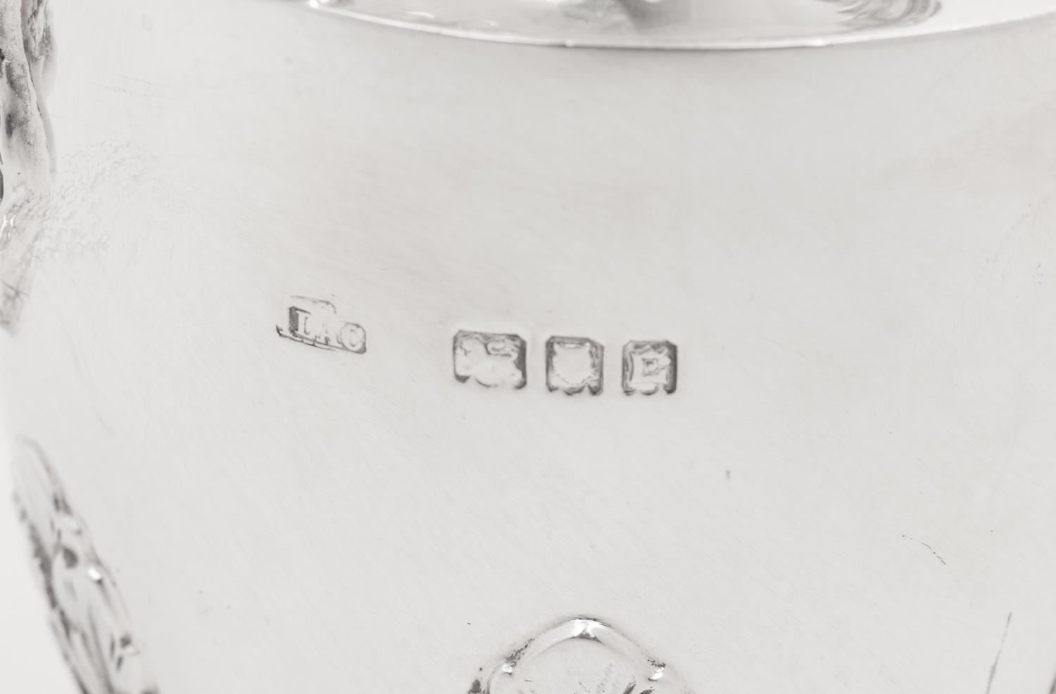 A Pair of English Silver Covered Vases