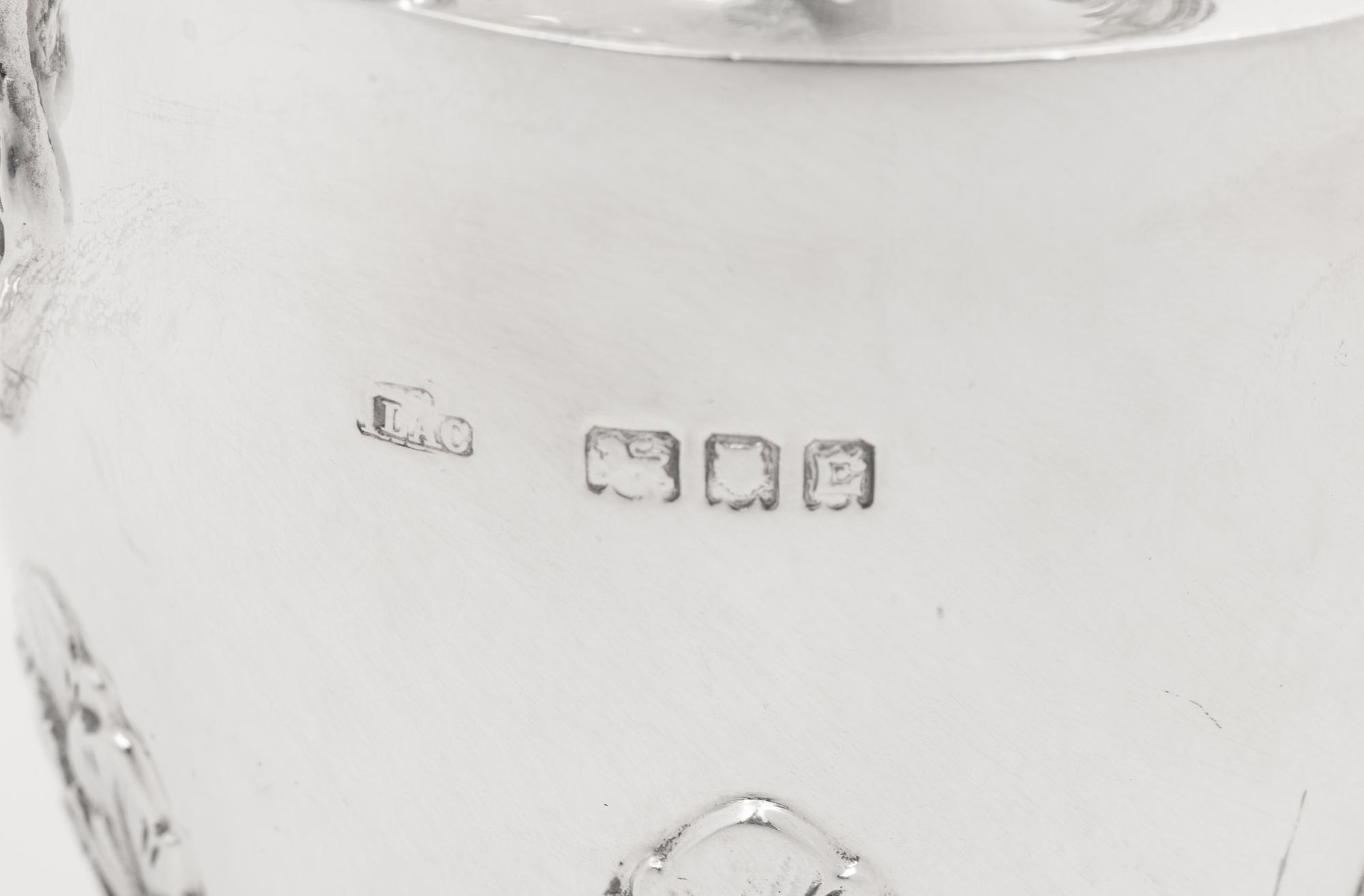 A Pair of English Silver Covered Vases