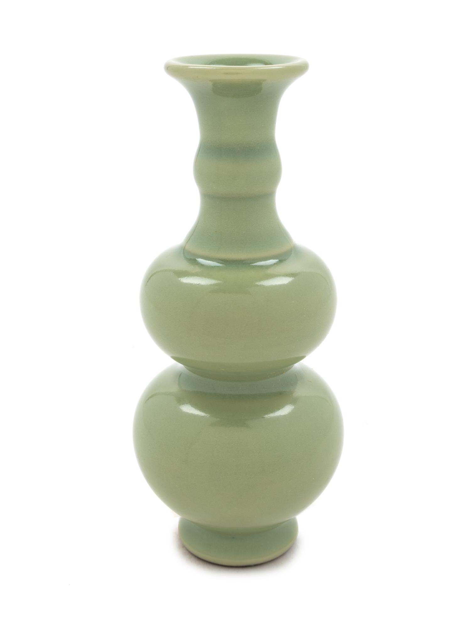A Small Celadon Glazed Porcelain Gourd-Form Vase
