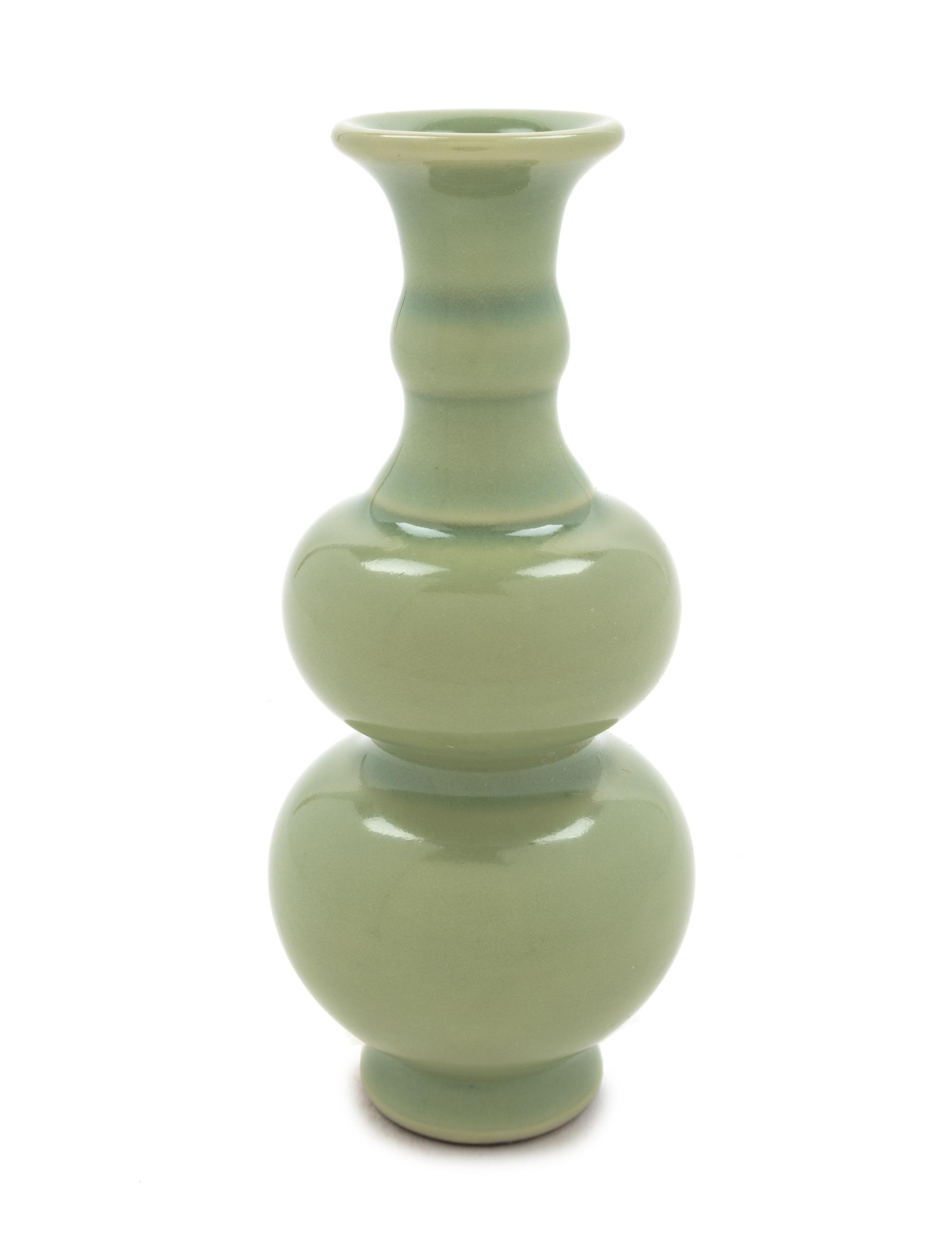 A Small Celadon Glazed Porcelain Gourd-Form Vase