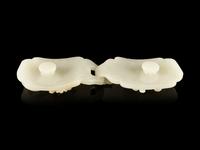 A Carved White Jade ‘Chilong’ Belt Buckle
