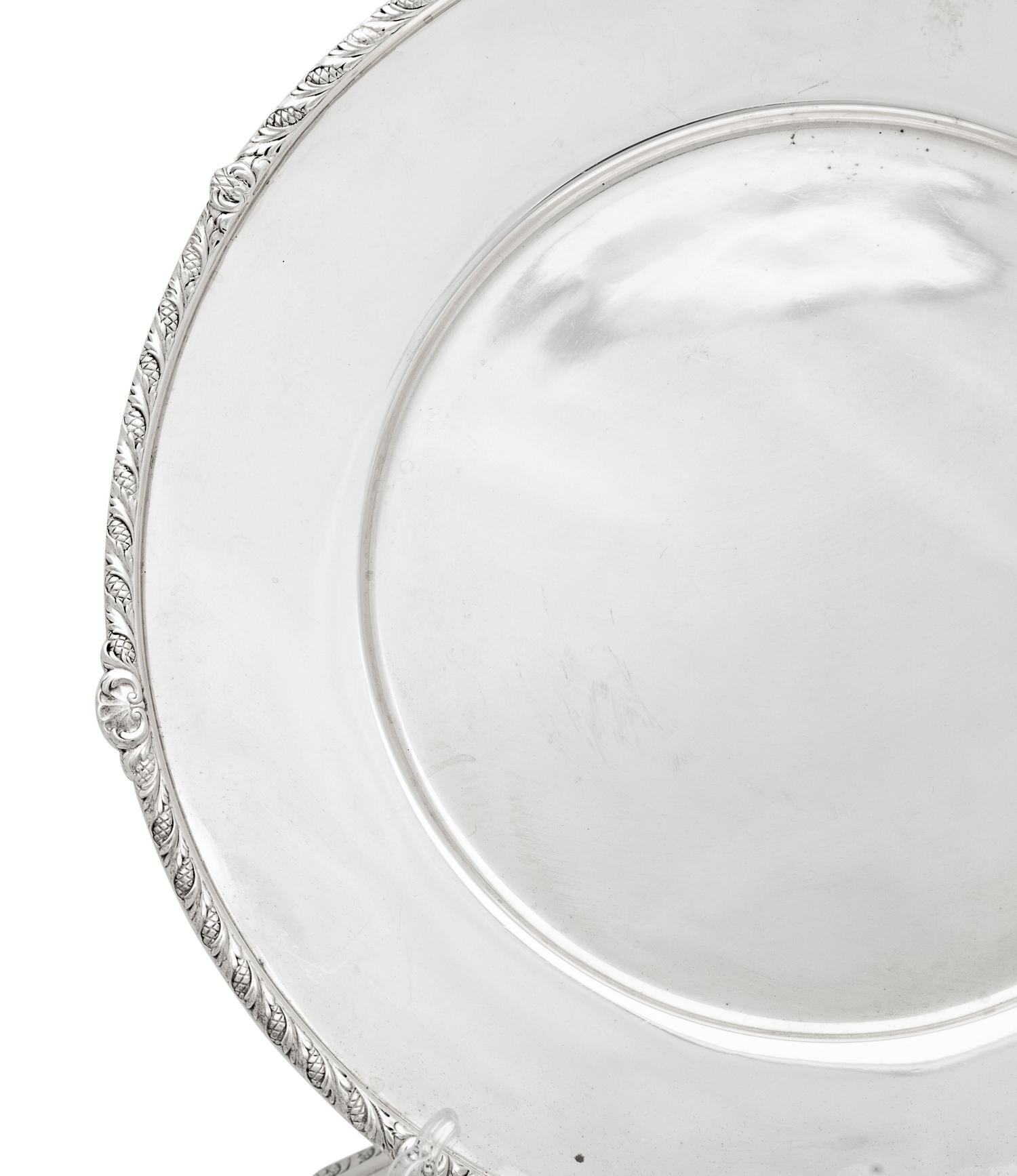 A Set of Twelve American Silver Chargers