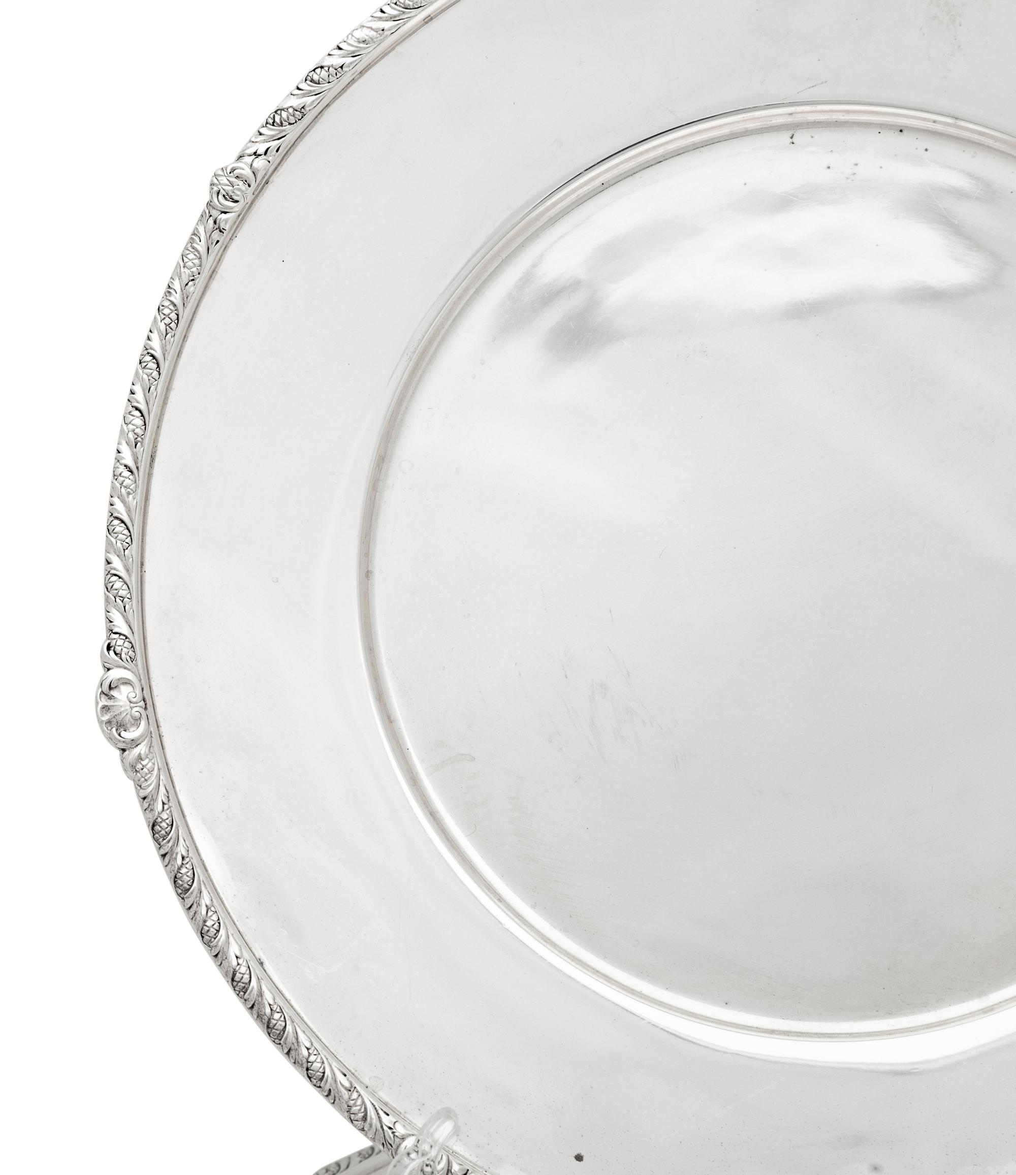 A Set of Twelve American Silver Chargers