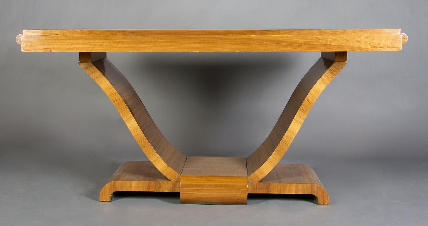 A French Art Deco Palisander Wood Extension Table, Height 30 1/2 x width 61 x depth 37 1/2 inches.