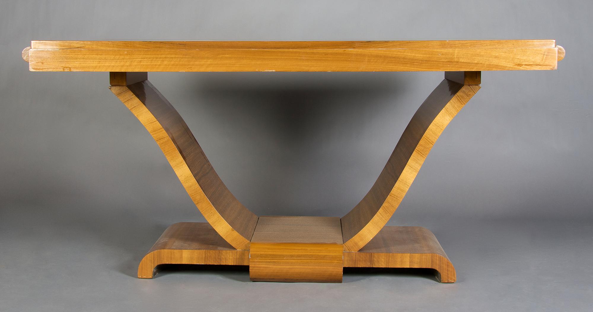 A French Art Deco Palisander Wood Extension Table, Height 30 1/2 x width 61 x depth 37 1/2 inches.