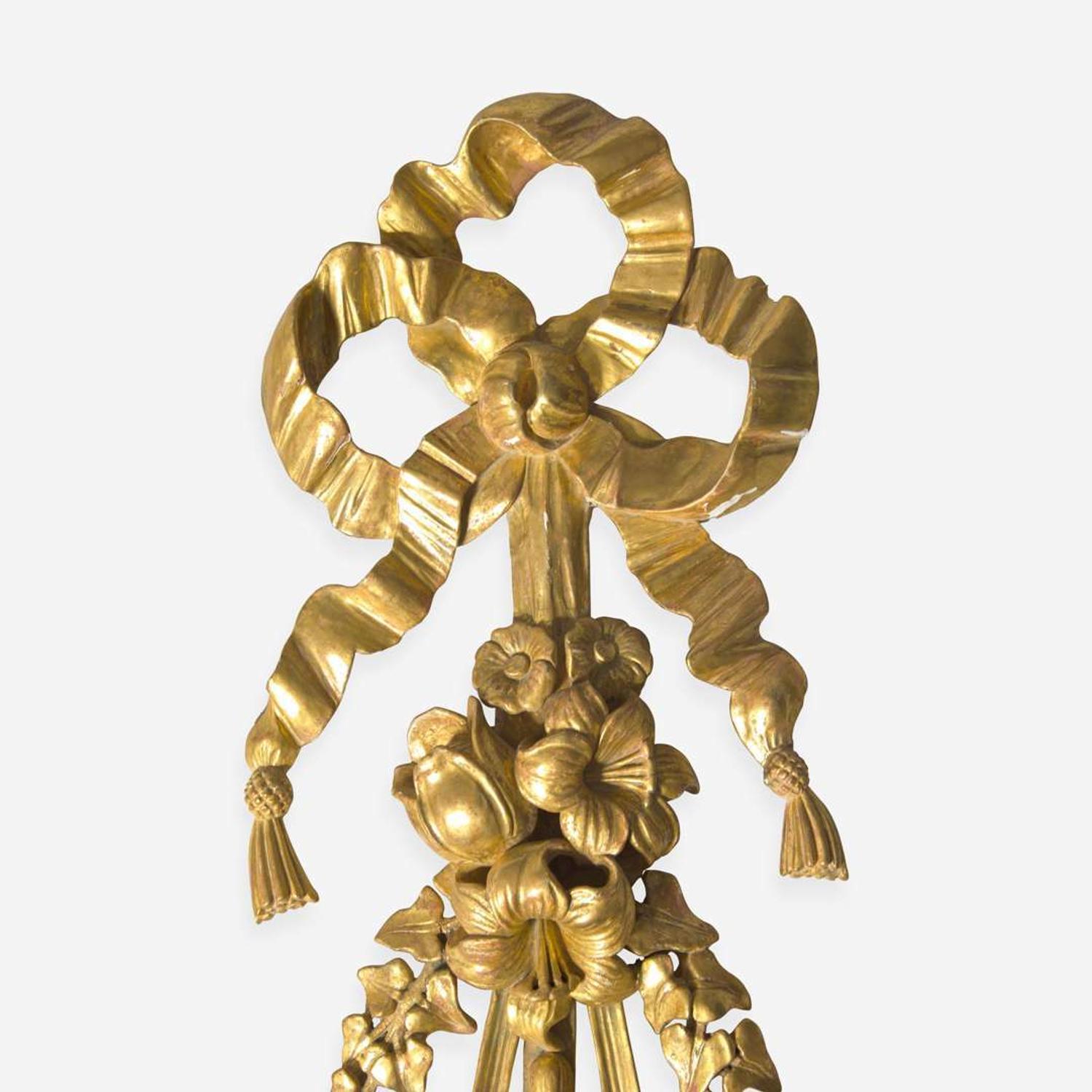 A group of four Georgian style giltwood ribbon, fruit, and floral swag wall appliques late 19th / 20th century