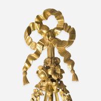 A group of four Georgian style giltwood ribbon, fruit, and floral swag wall appliques late 19th / 20th century
