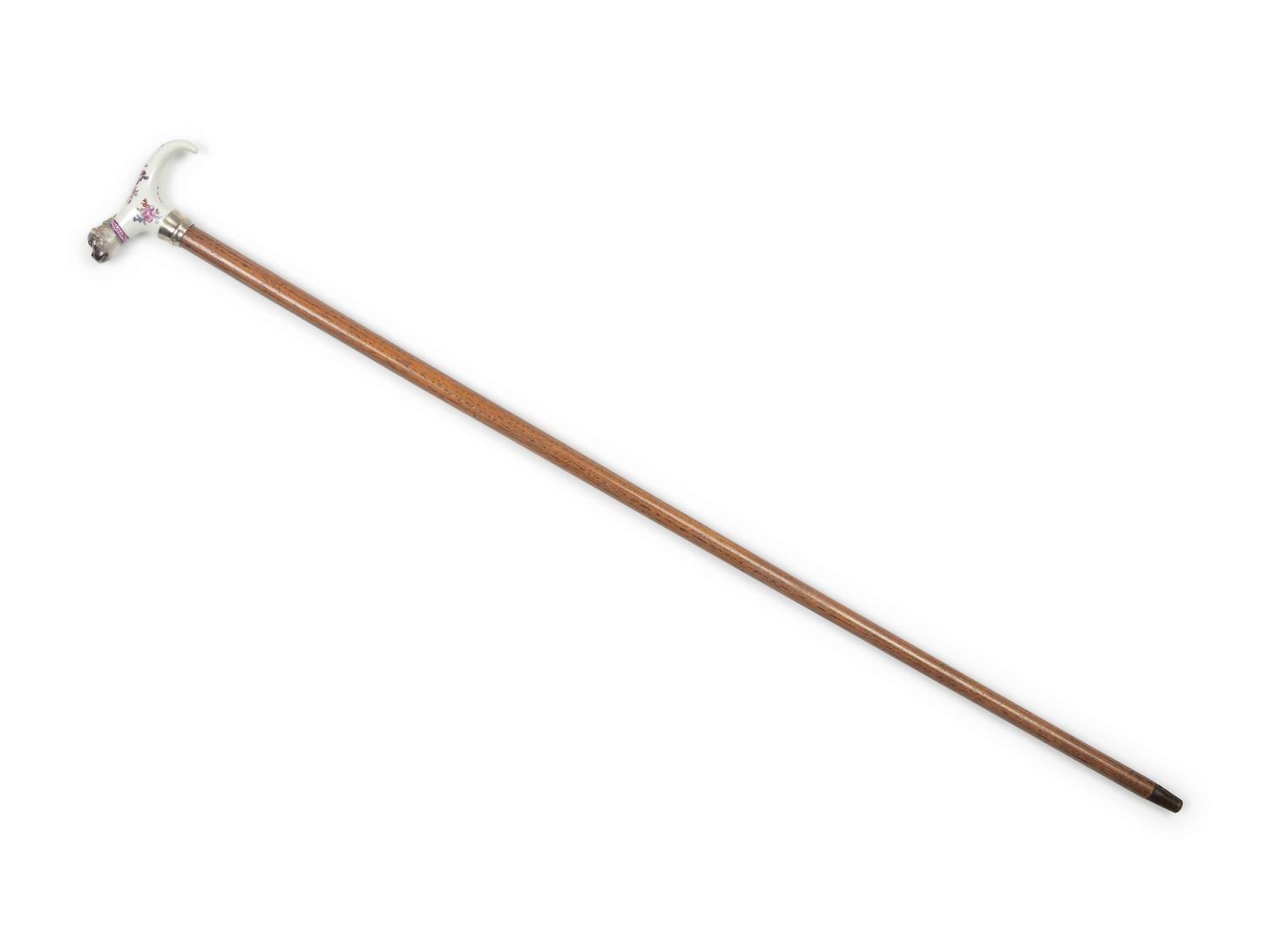A German Porcelain and Silvered Metal Mounted Walking Stick