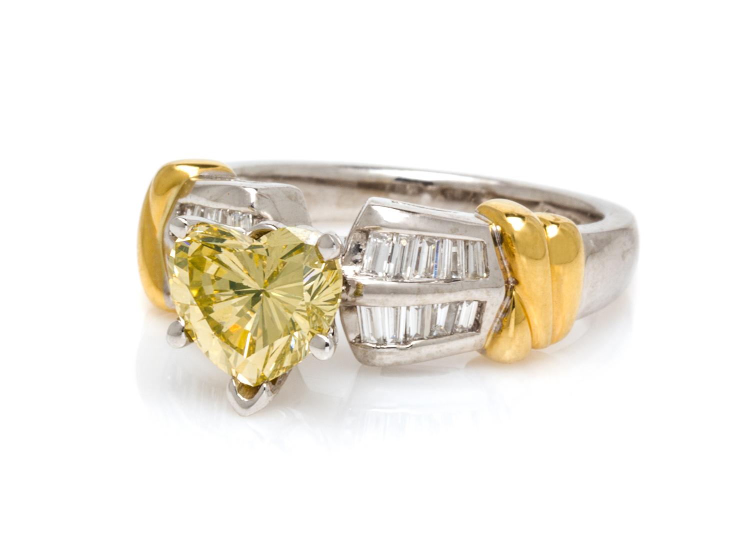 A Platinum, 18 Karat Yellow Gold, Colored Diamond and Diamond Ring, 6.30 dwts.