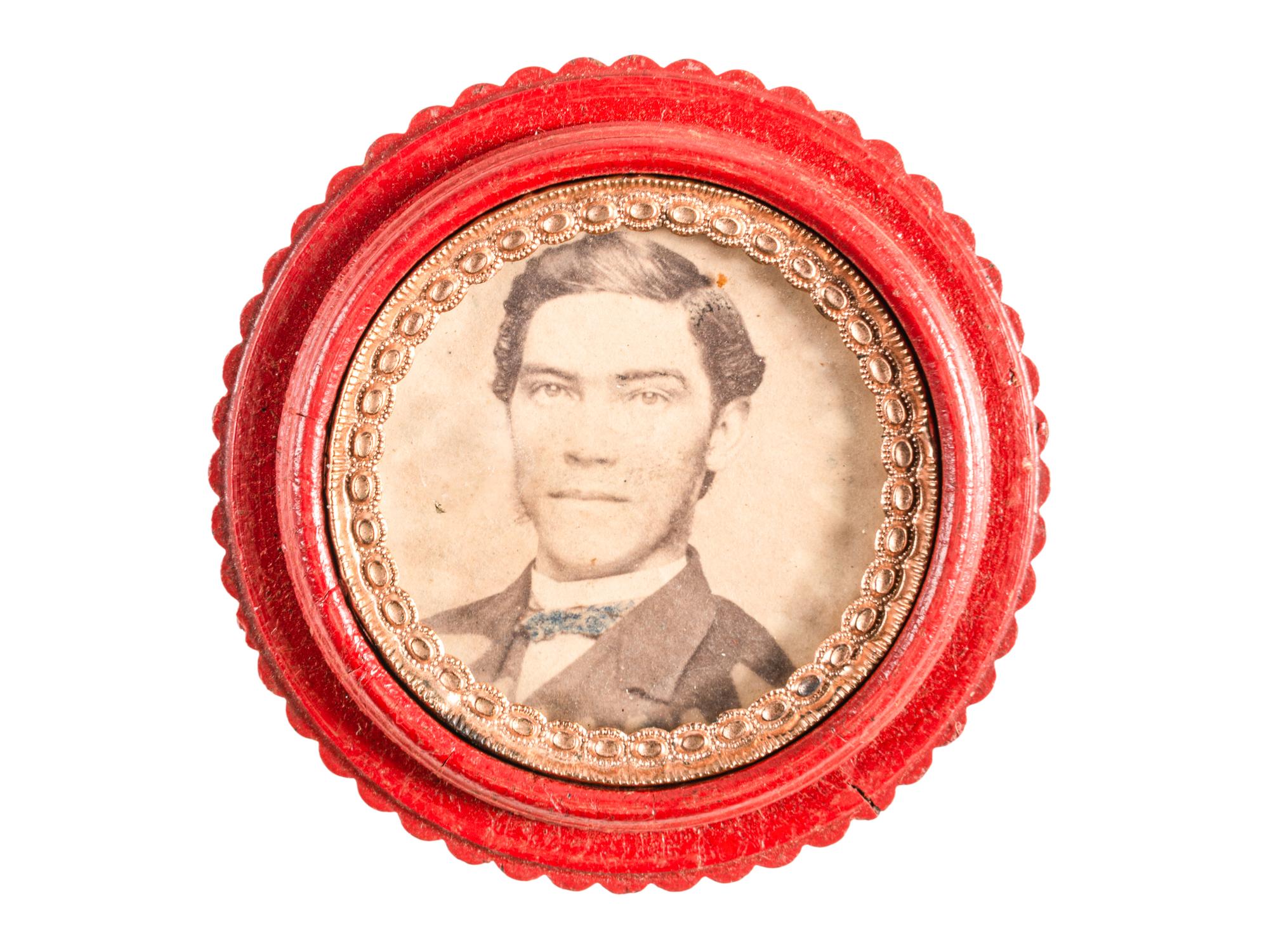 [EARLY PHOTOGRAPHY - UNION CASES]. A group of 7 red "oreo" cases containing assorted portraits, including: