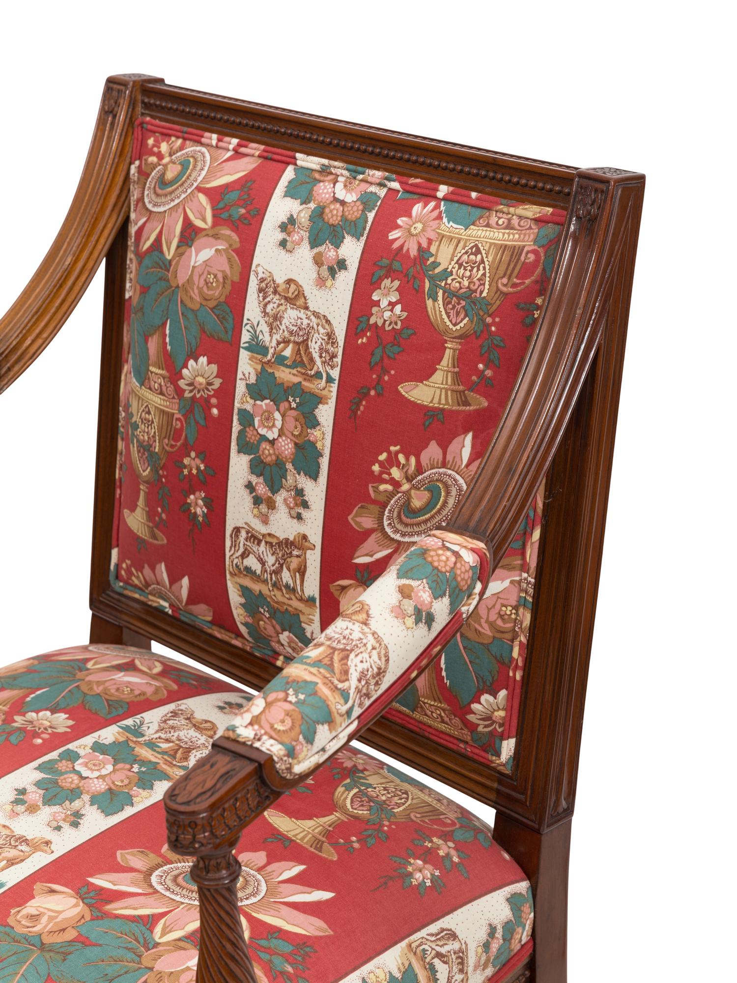 A Pair of Louis XVI Style Fauteuils with Striped Upholstery