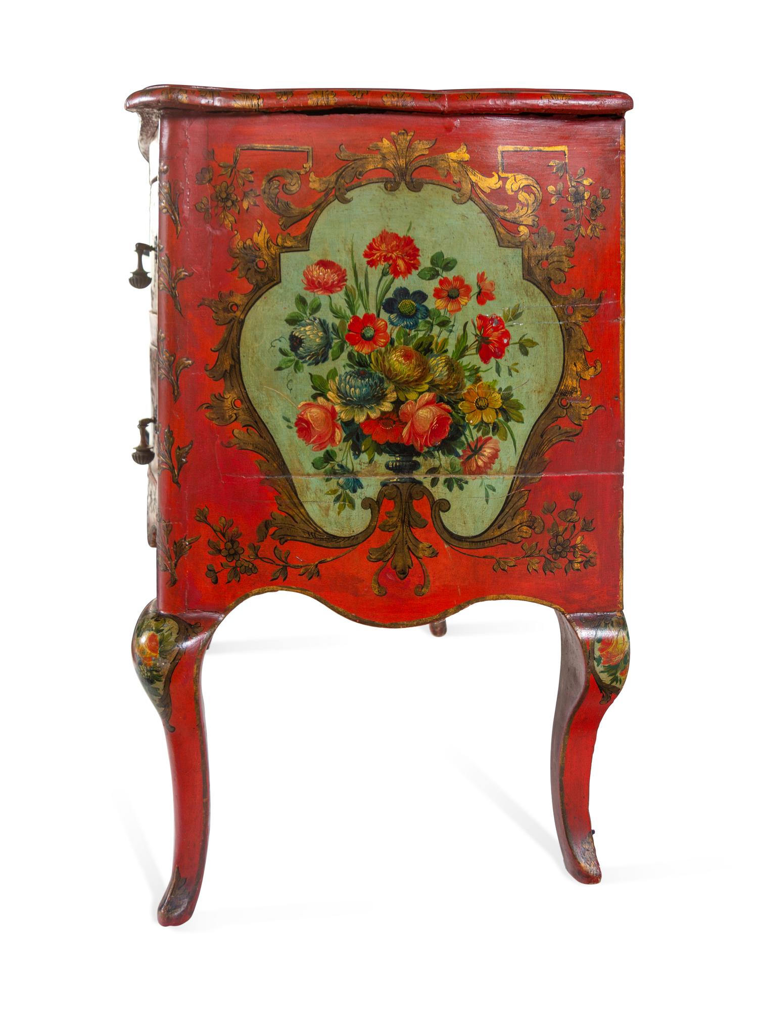 A Venetian Parcel Gilt and Polychrome Decorated Commode
