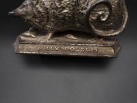 A 'Billy Possum' Cast Iron Still Bank